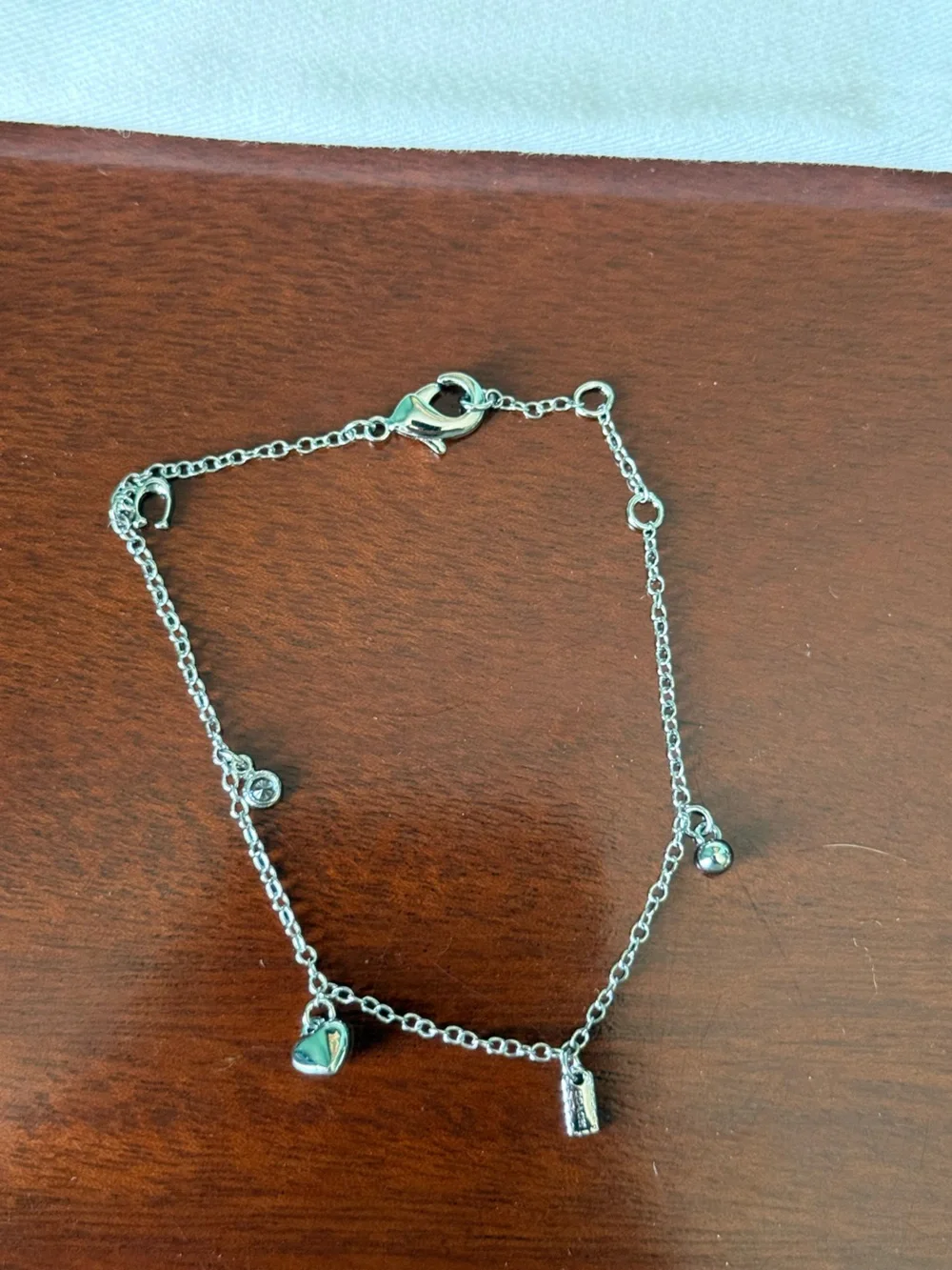Coach Silver Heart & Charm Dangle Bracelet